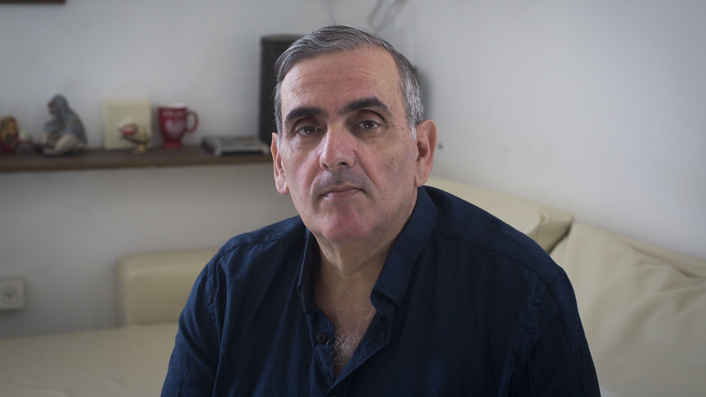 Grunbaum found himself living a double life, visiting his biological mother and his five siblings while hiding the truth from his adoptive parents [Oren Ziv/Al Jazeera]