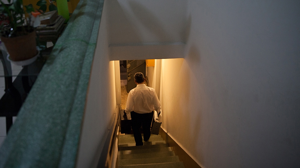 Donovan leaves a house in the middle-class neighbourhood of Colonia del Valle, Mexico City [Benedicte Desrus/Al Jazeera]