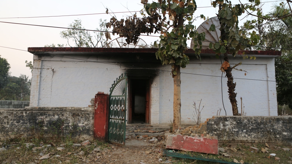 A community radio station run by Tharu people in Tikapur was burnt down after anti-constitution protest turned violent last year [Prabhat Jha/Al Jazeera]