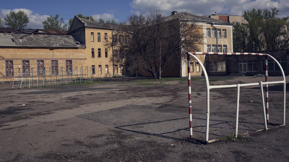 The frontline is just a few kilometres away from the school and the area has been shelled heavily during the conflict [Kyrre Lien/ Al Jazeera]