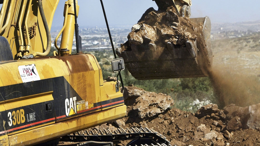 File: Caterpillar bulldozer west bank