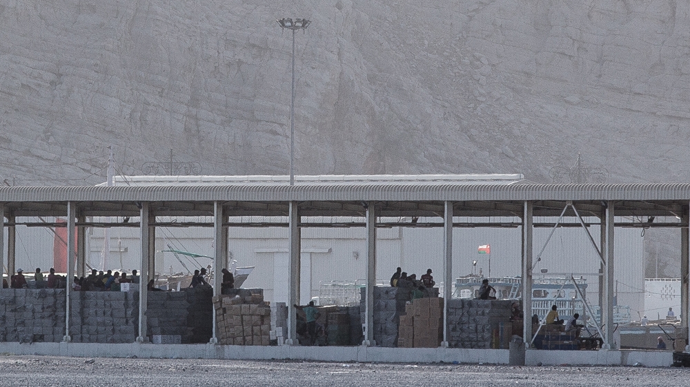 'Smugglers quay' at Khasab, Oman, on July 21st, 2016. Everyday, dozens of Iranian speedboats arrive to pick up products coming from the UAE [Sebastian Castelier/Al Jazeera]