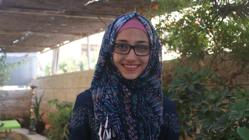 The visit marked was the second time Yara was allowed to hug her father; the first time she was too young to understand what it meant [Ylenia Gostoli/Al Jazeera]