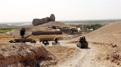 Afghan Army soldiers patrol in the 2nd district of Lashkar Gah city, Afghanistan [EPA]