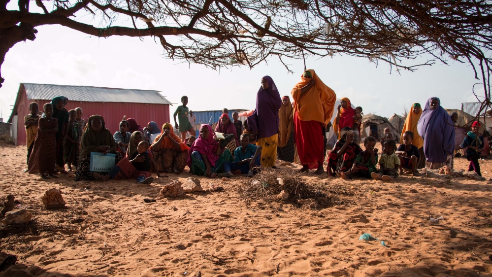 A makeshift settlement built by returning refugees from Kenya to Kismayo in southern Somalia is currently home to at least 16,000 people [Ashley Hamer/Al Jazeera]