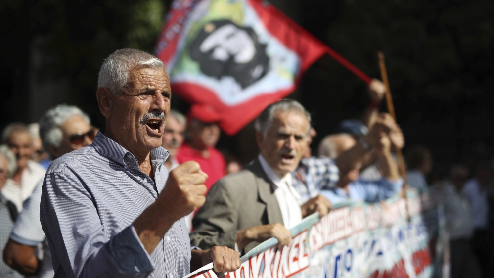 The Pensioners' Federation, which organised the march, said tempers frayed when the police blockaded a street [Petros Giannakouris/AP]