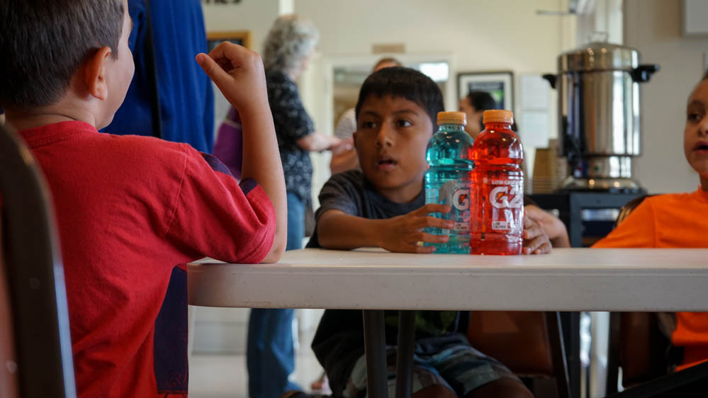 Ivan Ramirez, right, spent almost a tenth of his life in detention centres [Patrick Strickland/Al Jazeera] 