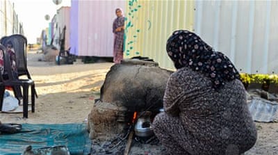 Hundreds of Palestinian families in Gaza still live in caravans after being displaced during the 2014 war [Sanaa Kamal/Al Jazeera]