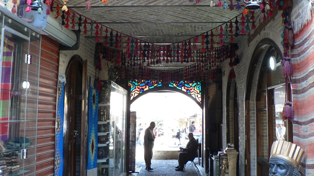 The entrance of the newly restored Farah Hotel in the heart of the Sulaimania Bazaar, Iraq [Lara Fatah]