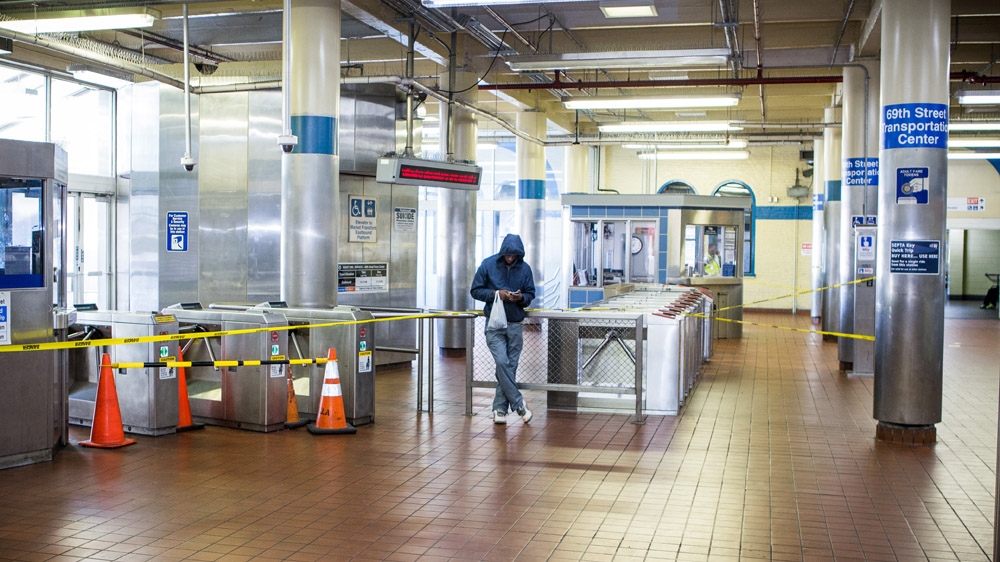 One Passenger at the 69th Street SEPTA Station [Ricardo Kuettel/Al Jazeera] 