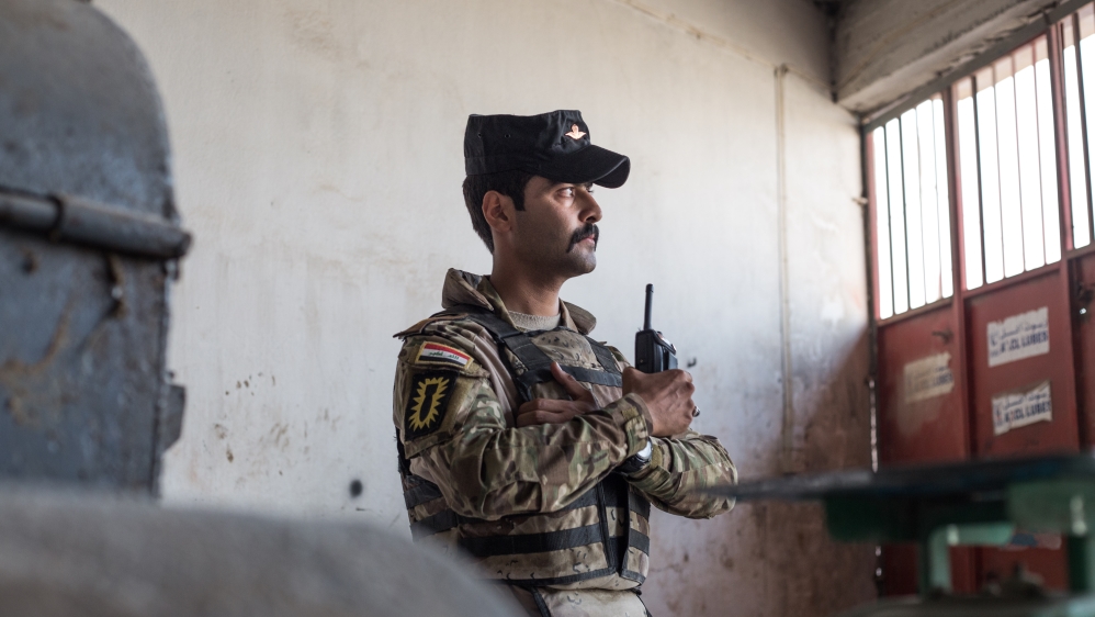 
Abdulkadir is one of a team given the often lethal job of disabling the weapons, typically left by ISIL [John Beck/Al Jazeera] 