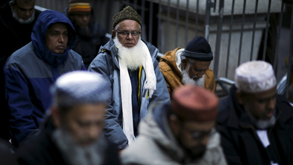 Muslims pray as they take part in a protest against presidential candidate Donald Trump outside of his office in Manhattan