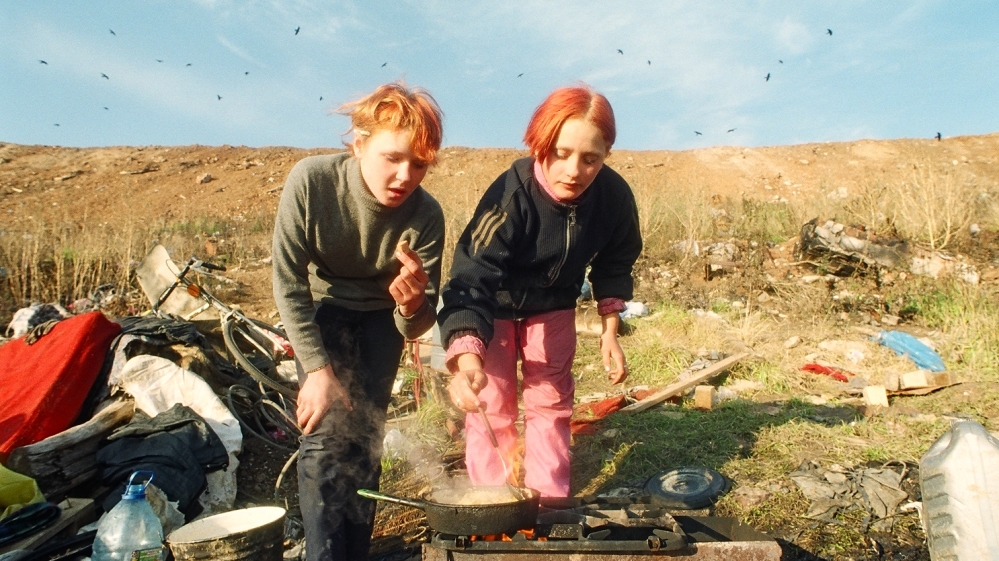 Yula, right, and a friend cook in the svalka [Courtesy of Hanna Polak]