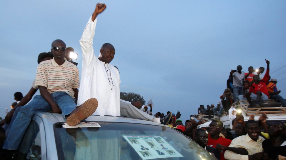 UDP supporters cheer for their presidential candidate Barrow during a rally in Banjul