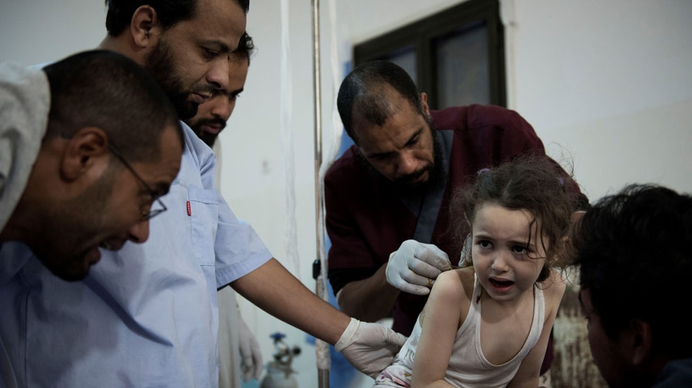 Children are traumatised by the bombs and fighting outside [Alessio Romenzi/Al Jazeera]