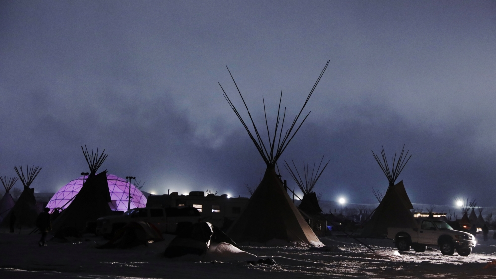 What was a rough encampment is looking increasingly permanent as protesters dig in for winter [Reuters]