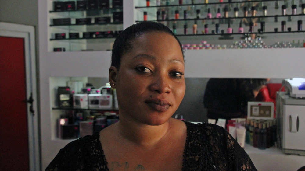 Jennifer Acheampong, 32, beautician [Brennan Weiss/Al Jazeera]