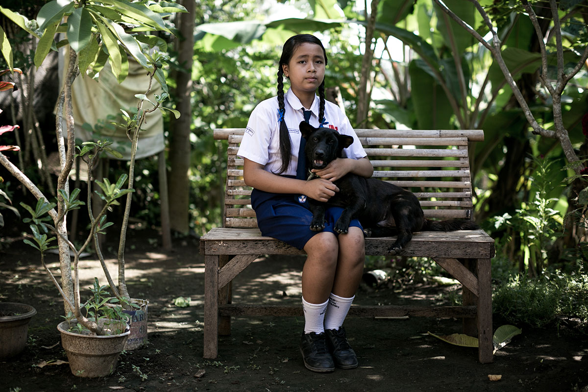 A Solo Balinese Girl Stray Dogs Rescuer/ Please Do Not Use