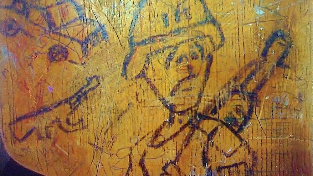 Elementary school students produced the drawings as part of an investigation into the effects of the conflict on children in northern Jalisco [Stephen Woodman/Al Jazeera] 