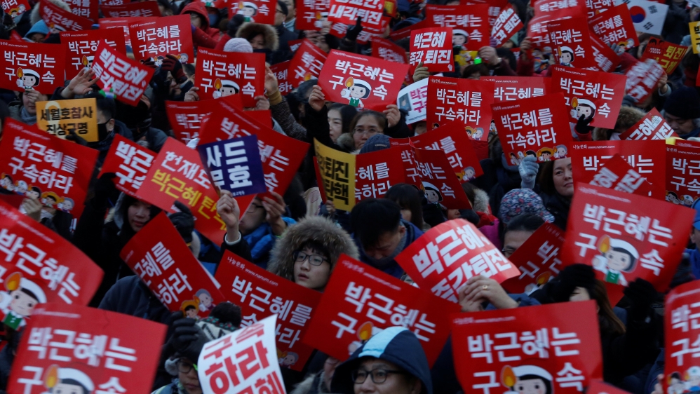 Thousands have demanded the resignation of President Park Geun-hye over the scandal [Kim Hong-ji/Reuters]