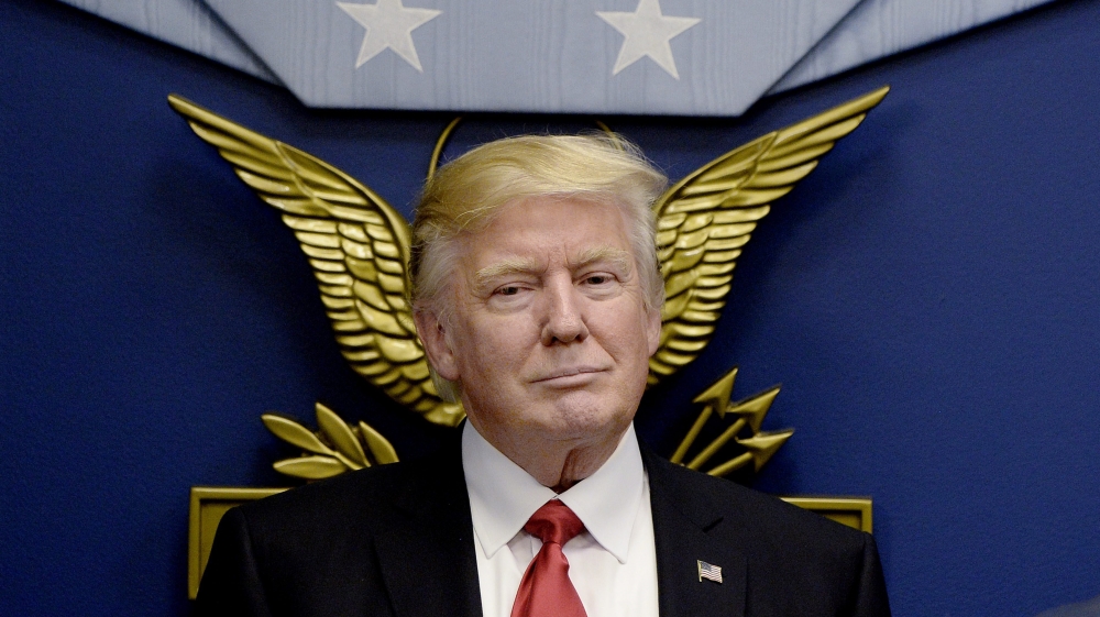 US President Donald Trump signs Executive Orders at the Pentagon in Arlington, Virginia