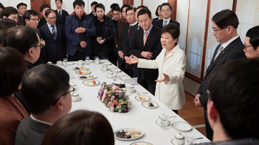 South Korean President Park Geun-hye speaks during a meeting with reporters at the Presidential Blue House in Seoul