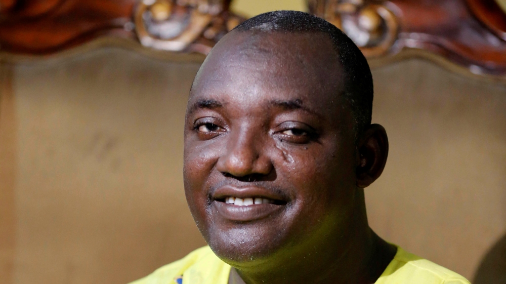 The new president of Gambia, Adama Barrow poses for a picture at his home in Yarambamba, West Coast Region, Gambia
