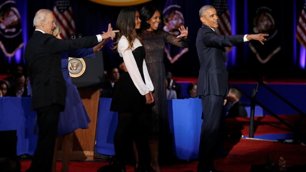 Obama described Vice President Joe Biden and his wife Jill as 'family' in an emotional finale to his speech [John Gress/Reuters]