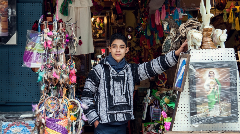 Sebastian Alexis, a Tijuana souvenir vendor, says he has seen a decline in sales since Trump has taken office [Jessica Chou/Al Jazeera]