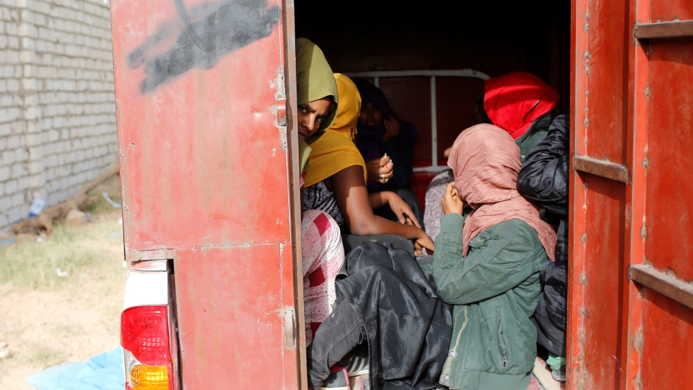 FILE PHOTO: African migrants are transferred to a detention centre after being detained in Zawiya, northern Libya