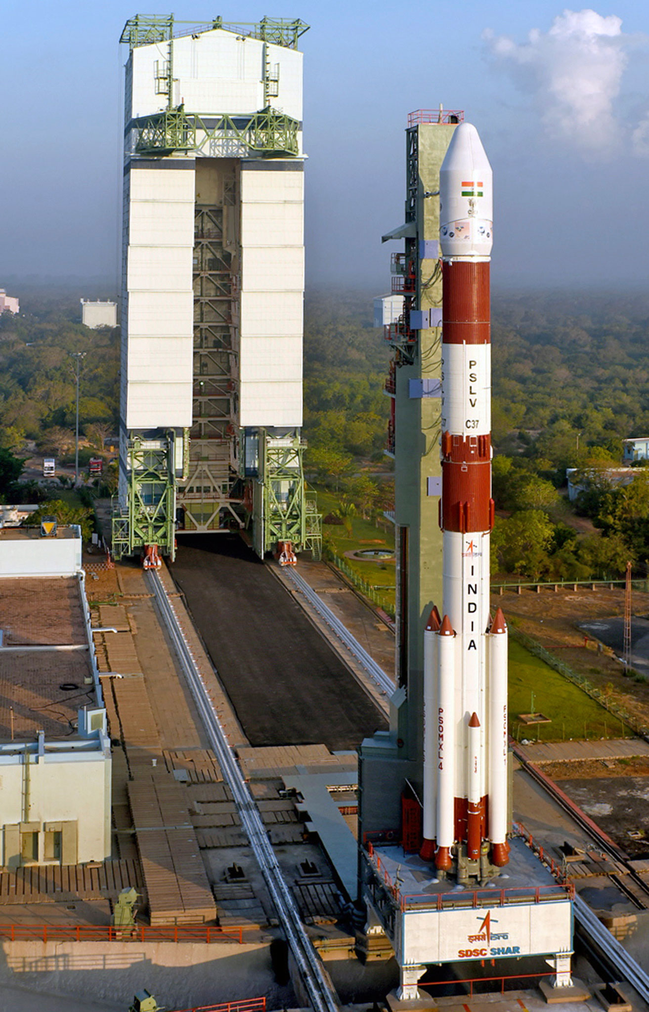  Indian Space Research Organisation (ISRO) built the PSLV-C37 seen here with a Mobile Service Tower at the Satish Dhawan Space Centre in Sriharikota [EPA] Indian Space Research Organisation (ISRO) built the PSLV-C37 seen here with a Mobile Service Tower at the Satish Dhawan Space Centre in Sriharikota [EPA]