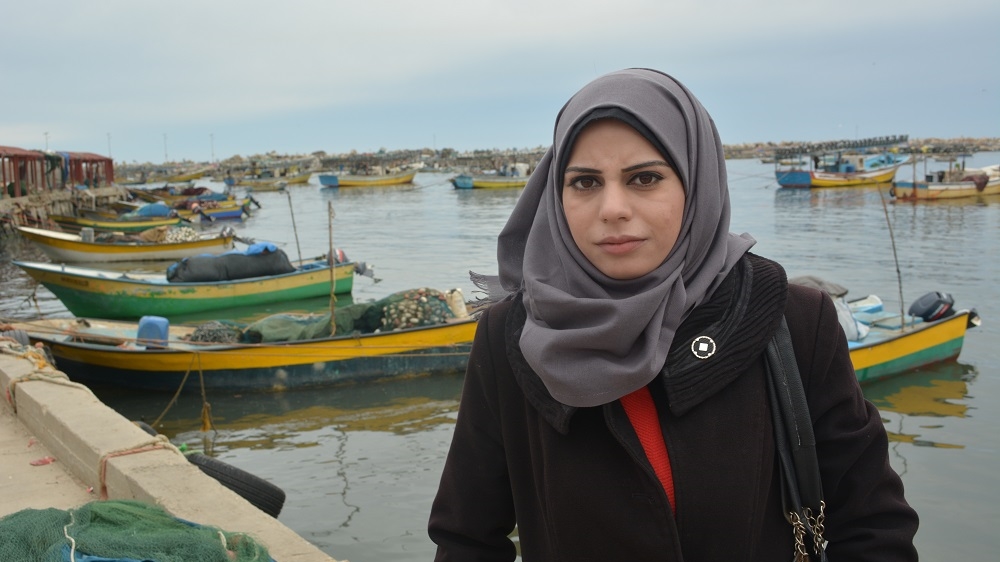 It has been nearly a decade since 22-year-old Madleen Kullab took over her father's role as a fisherman and the family's breadwinner [Mersiha Gadzo/Al Jazeera]