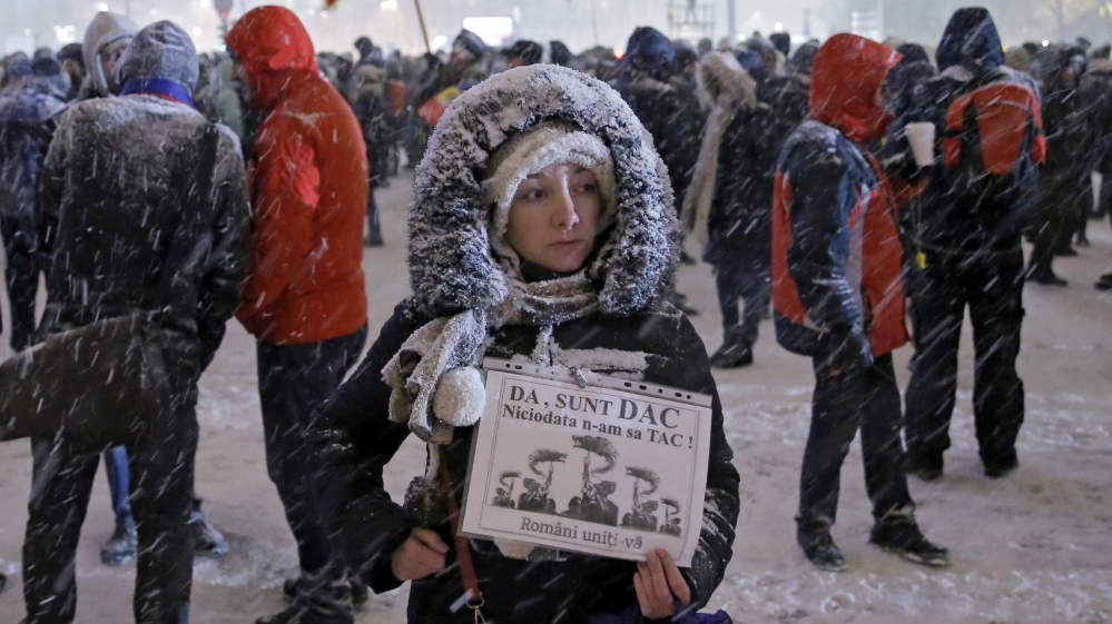 Anti-government protesters continue to gather in front of government headquarters