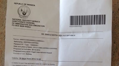 A letter presented to refugees on arrival in Rwanda [Yermi Brenner/Al Jazeera]