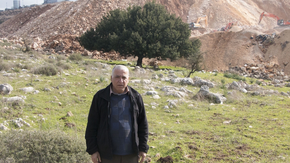Omar Fazaa initially fought back against the theft of his land, but he no longer thinks the fight is worth it [Ylenia Gostoli/Al Jazeera]