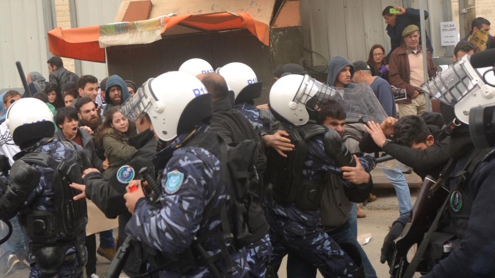 The case of Araj's killing sparked widespread criticism of the PA's security coordination with Israel [Zann Huizhen Huang/Al Jazeera]