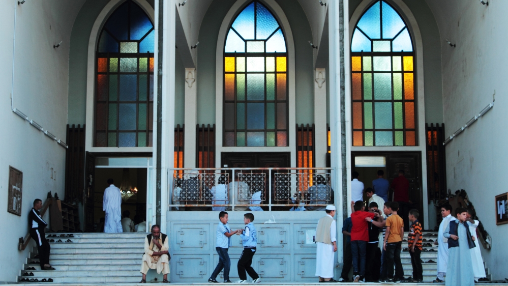  Looking out my window I see everyday life continuing, with its busy shops, heavy traffic ... [Gaia Anderson/AP]