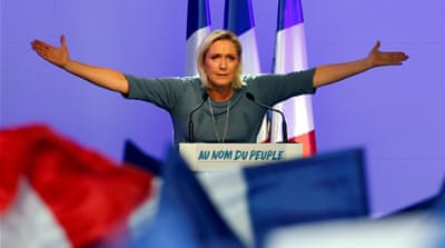 Marine Le Pen, French National Front (FN) political party leader, gestures during an FN political rally in Frejus