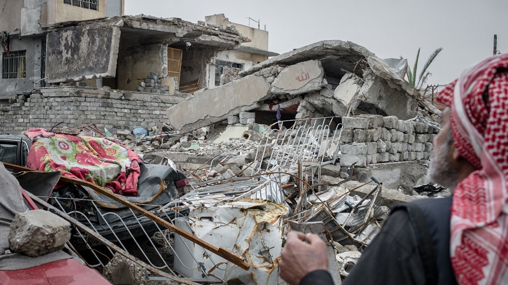  Two large blasts in quick succession knocked her to the ground, filling the air with dust, rubble and confusion [Cengiz Yar/Al Jazeera]