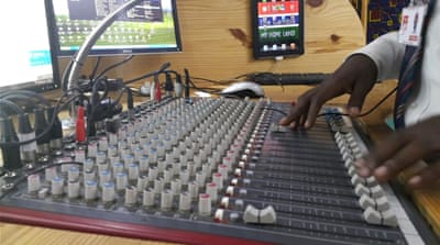 'Since I was a child I saw a lot of things but I could not open my mouth. Anyone could report you to Jammeh's people and you might not be seen again,' says rapper Big Faa [Hamza Mohamed/Al Jazeera]