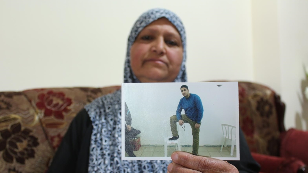 Abdullah, Anaam Hamed's son, was detained after Israeli soldiers raided his home in Silwad [Shatha Hammad/Al Jazeera]