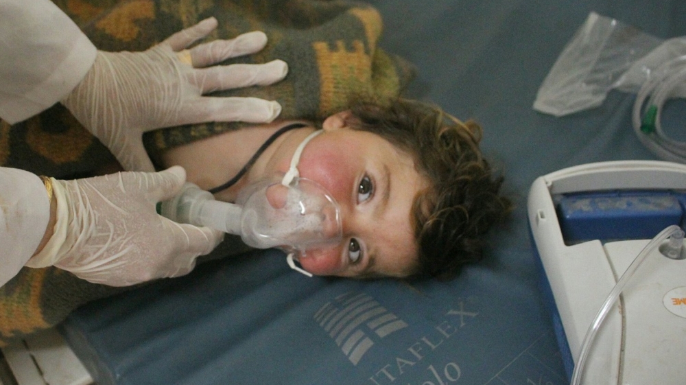 At least 58 killed in suspected gas attack in northern Syria, NGO