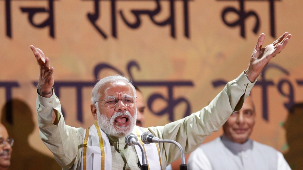 India''s Prime Minister Narendra Modi addresses his supporters at Bharatiya Janata Party (BJP) headquarters in New Delhi