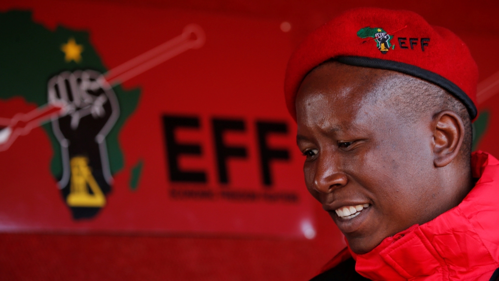 Julius Malema, the firebrand leader of South Africa's Economic Freedom Fighters (EFF) looks on before addressing his supporters during his campaign, ahead of the August 3 local government elections