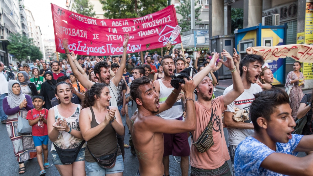 Refugees and solidarity activists have been protesting together against the far-right and EU policies [Kelly Lynn Lunde/Al Jazeera] 