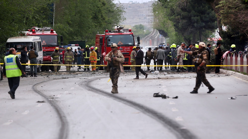 Witnesses said the attacker targeted the convoy as it passed near an NDS checkpoint [Massoud Hossaini/AP]