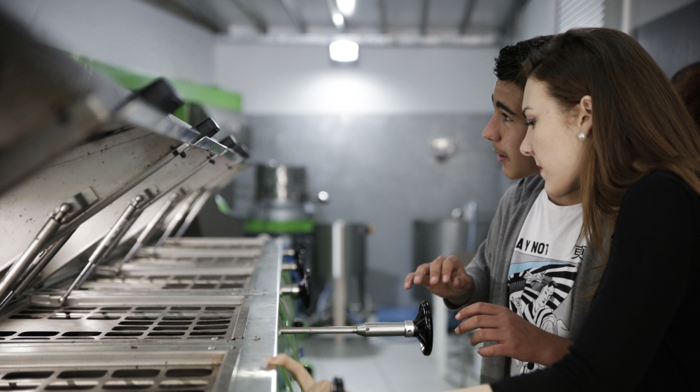 Maria Kalaboka moved back home to Lesbos this month Lesbos from Thessaloniki to work in her family's olive oil producing business [Nikolia Apostolou/Al Jazeera]