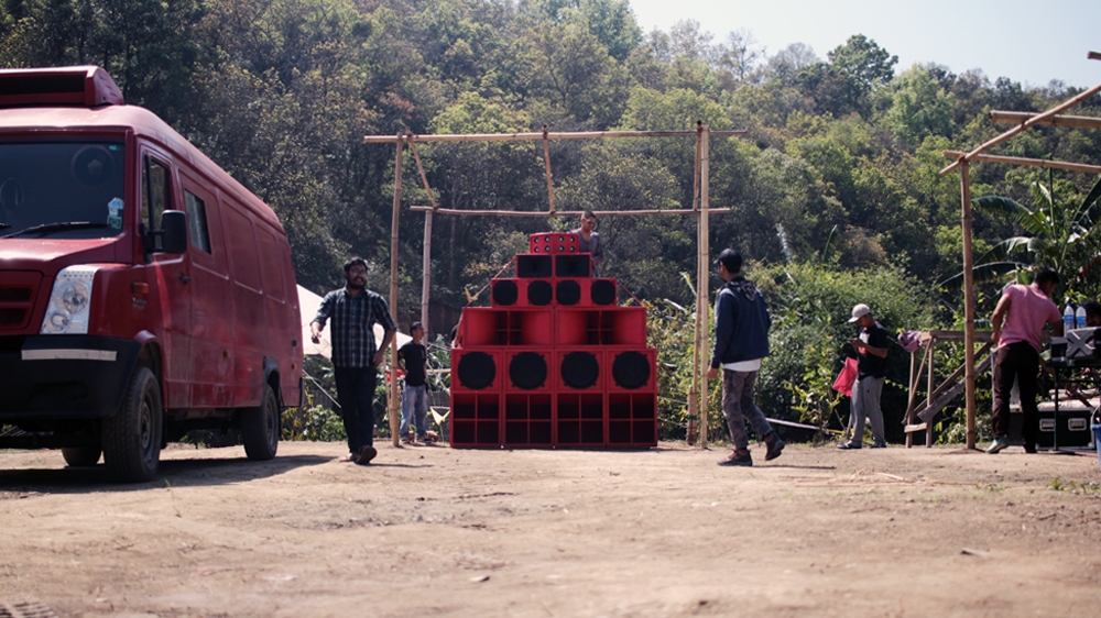 Taru Dalmia prepares his sound system for a show in Moirang, Manipur on March 16, 2017 [BFR Sound System/Al Jazeera]
