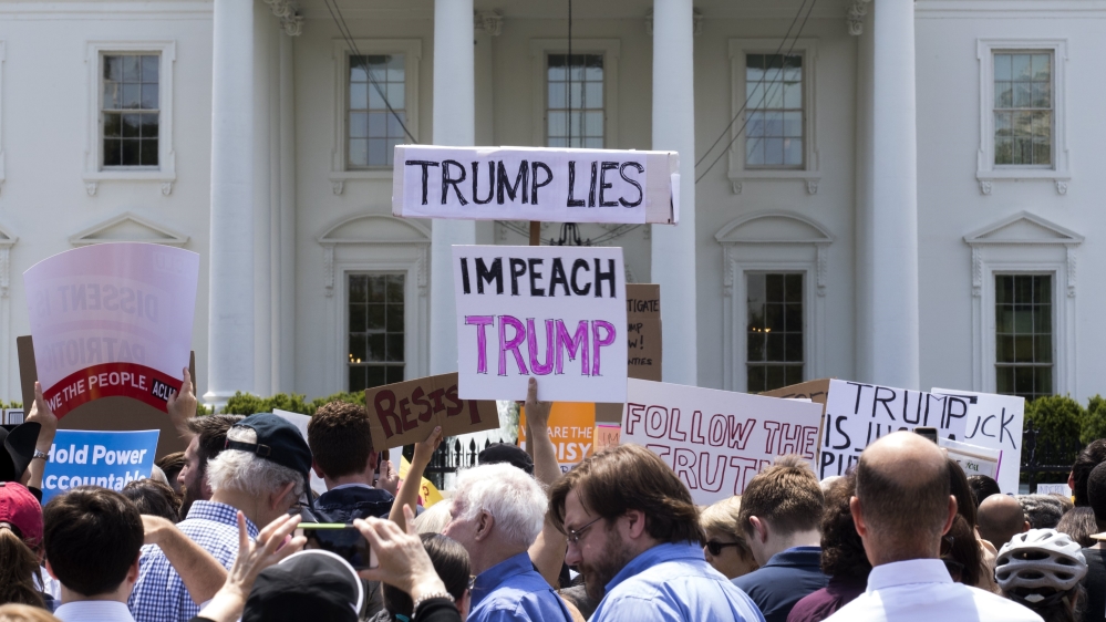 Protesters rally outside the White House in opposition to President Trump''s firing of FBI Director James Comey