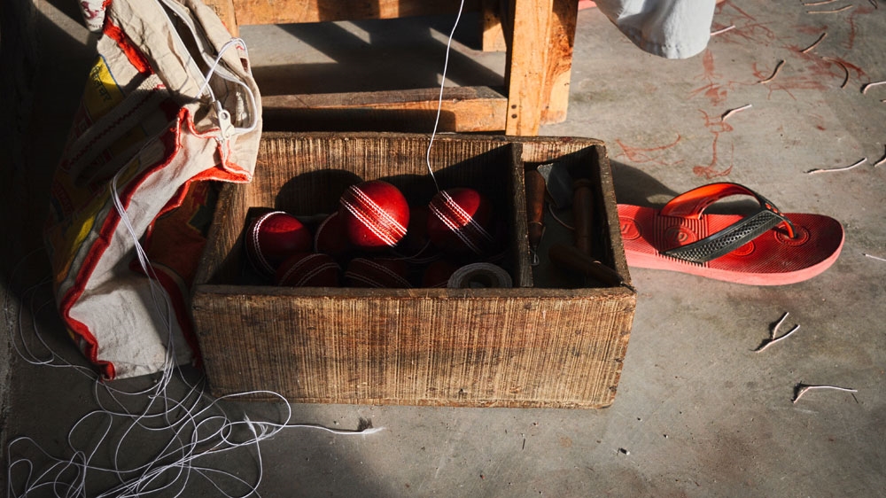 Fewer stitched leather balls are being produced owing to the shortage of buffalo hides [Maya Prabhu/Al Jazeera]